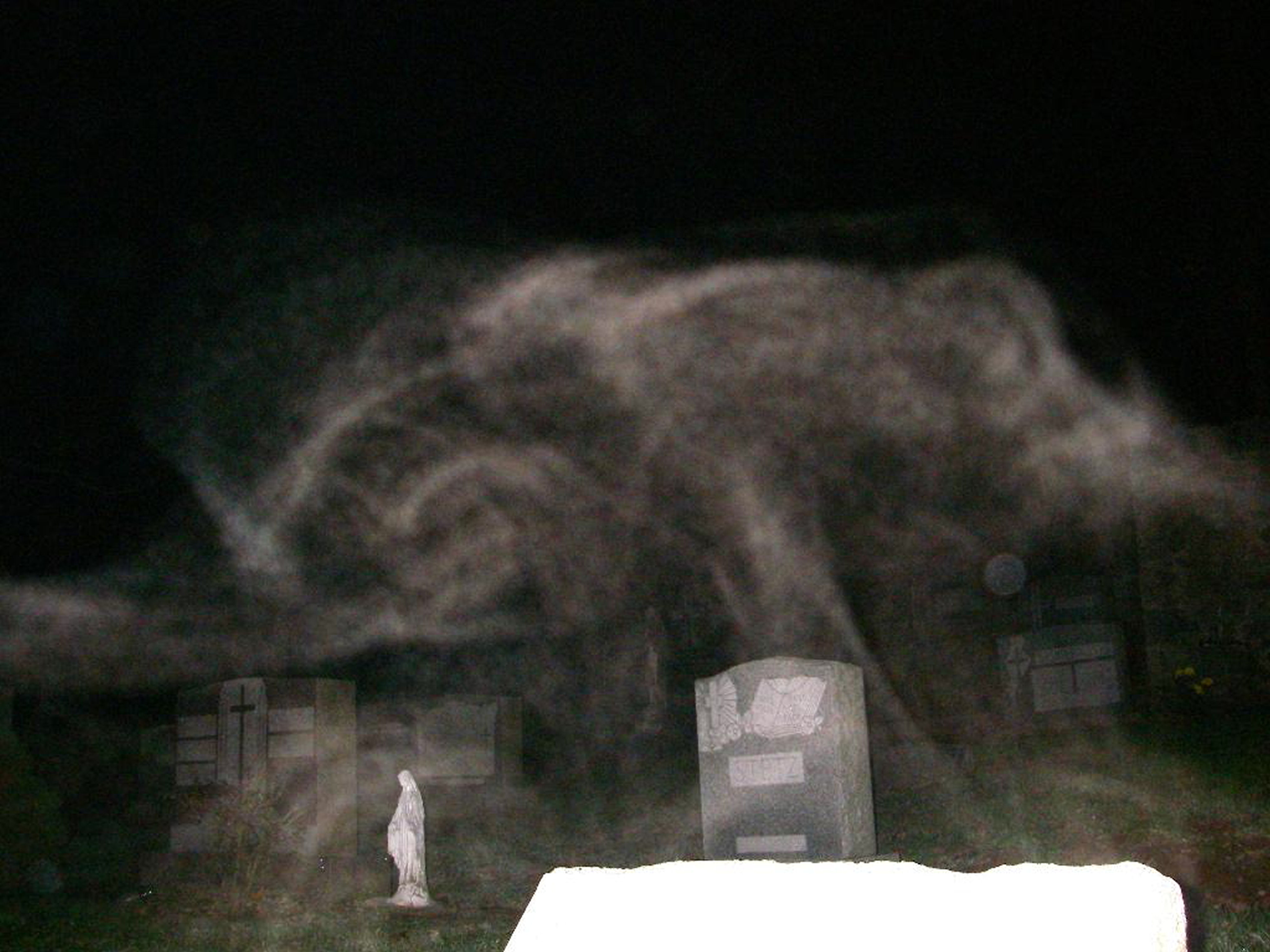 An aparition over a tomb at St. Joseph's Cemetery in Yonkers - Courtesy Yonkers Ghost Investigators